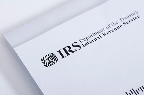 IRS emblem on paper, Economic Impact Payments