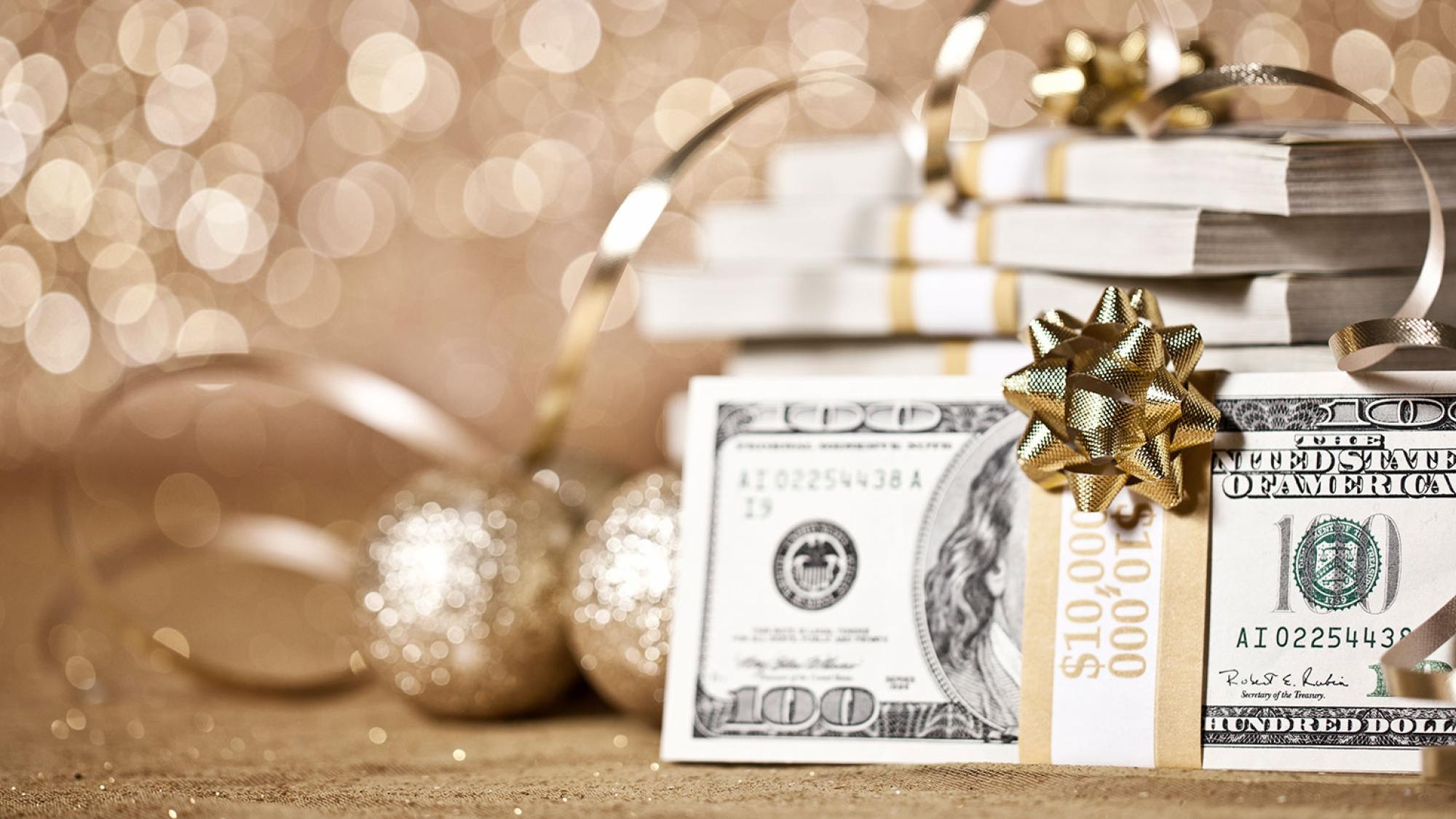 Image of money with gold bow