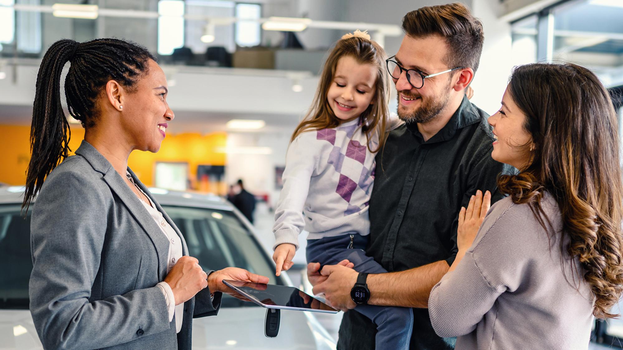 Couple buying vehicle