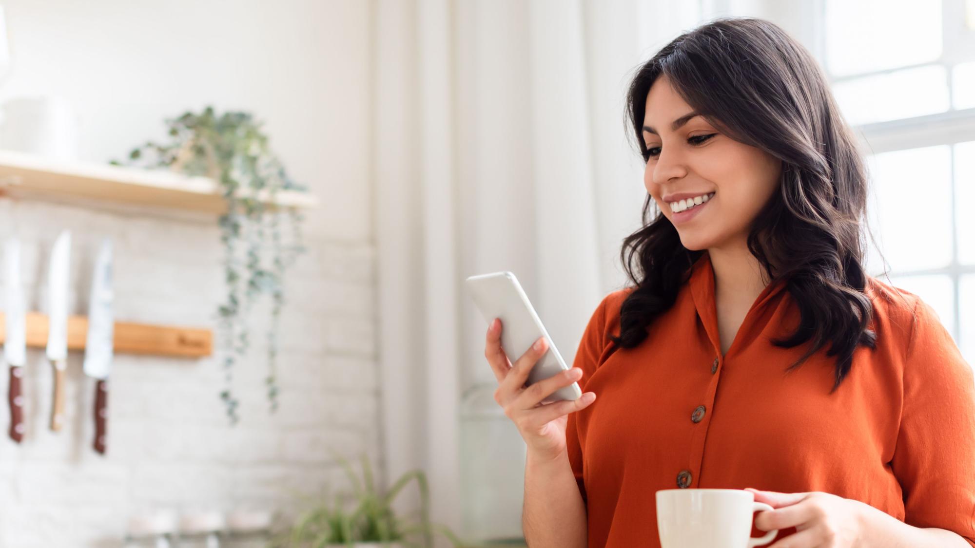 lady smiling at phone