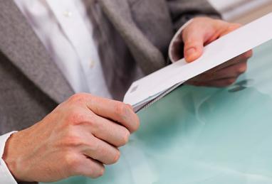 person opening a scam check 