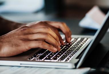 person on computer learning about security resolutions