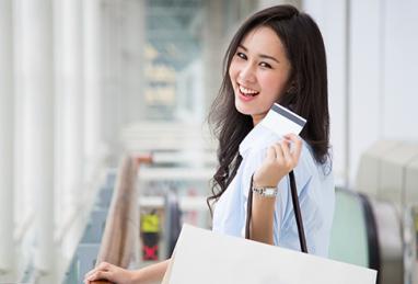woman shopping with store credit card