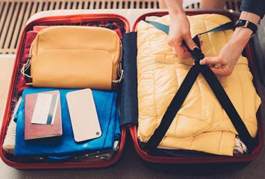 suitcase with credit card for vacation