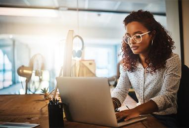 woman on laptop, online security