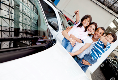 family next to new car, auto loans