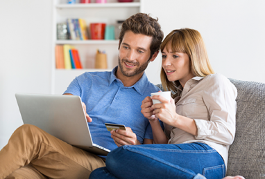 couple with laptop, balance transfers