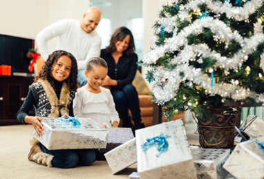 family next to christmas tree, credit card rewards