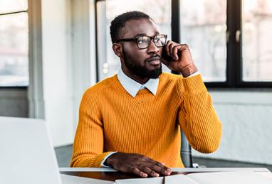 African-American Man on phone, phone call, computer, laptop, identity theft