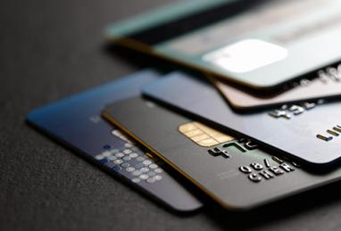 cards, credit cards, stack of cards, closeup, credit card fees, hidden fees 