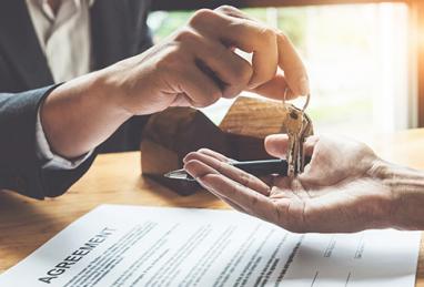 handing over keys to new home, buying a home, home buying, mortgage, mortgage loan