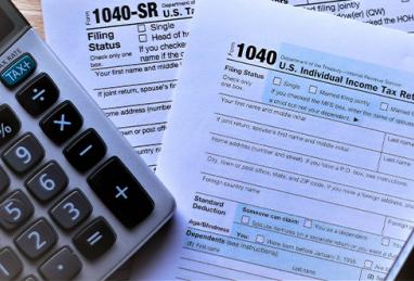 tax forms, calculator, keyboard, tax time, tax season, tax scams, avoiding tax scams, protect yourself from scams