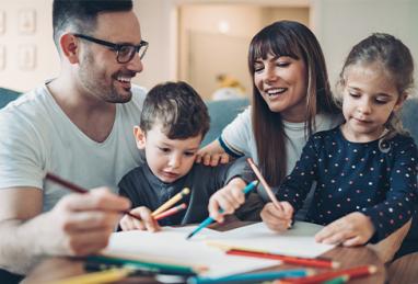 : family playing with school supplies, mother, father, son, daughter, budgeting for school supplies, back to school shopping, back to school budget 