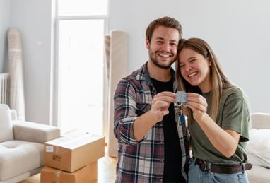 happy couple buying first house together 