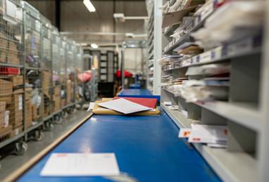mail sorting facility, post office, mail, letters, mail delays, postal delays