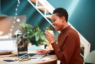 Woman working on her finances at home 