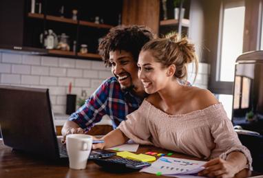 Young couple planning a home budget 