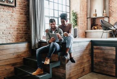 multiracial couple in modern loft