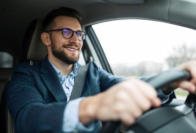 businessman driving in his car