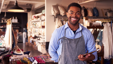 Store owner standing